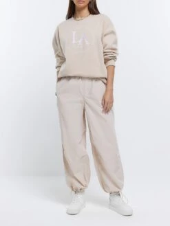 River Island Low Rise Parachute Trousers - Cream 9 River Island Low Rise Parachute Trousers - Cream -RIVE IS Clothing Shop 10ZB3 SQ3 0000000067 CREAM MDo