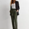 New Look Khaki High Waist Paperbag Trousers 1 New Look Khaki High Waist Paperbag Trousers -RIVE IS Clothing Shop VNWVX SQ1 0000005579 DARK KHAKI MDf